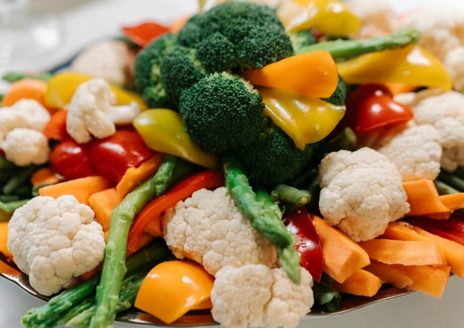 A vibrant assortment of fresh vegetables including broccoli, asparagus, and bell peppers.